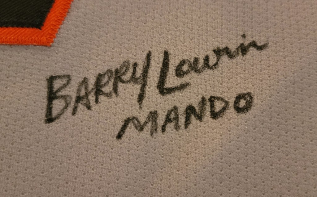 Signature of Barry Lowin with Mando written underneath